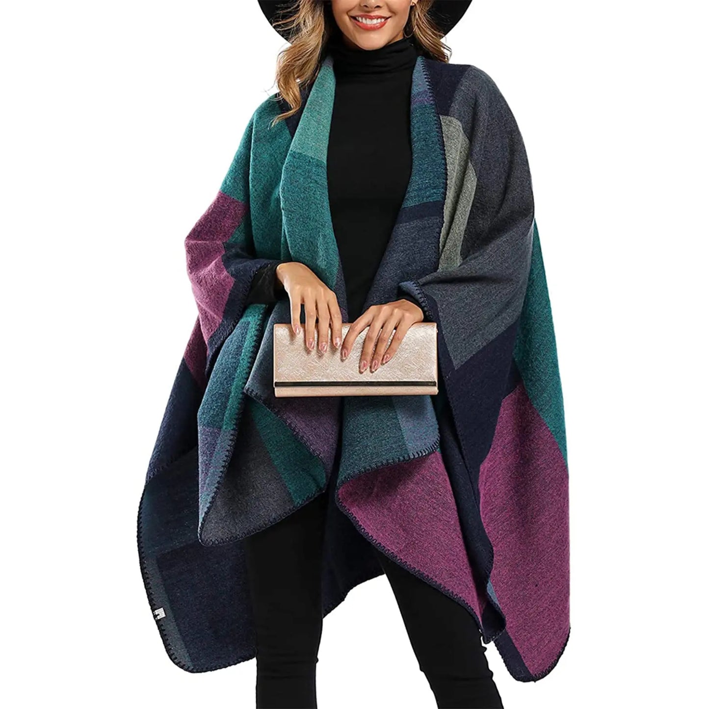 poncho abrigado en colores azul grisado, gris oscuro y fucsia